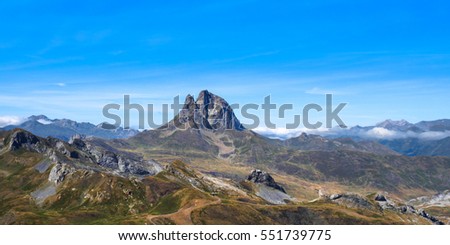 Summer landscape in the Pyrenees. Majestic Midi d'Ossau at centre.