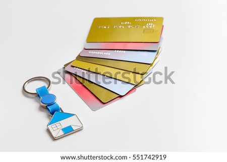 credit cards concept mortgag for new home on white background