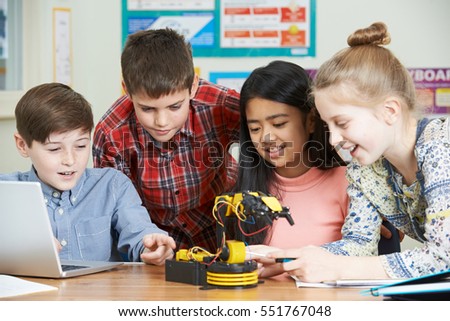 Pupils In Science Lesson Studying Robotics Royalty-Free Stock Photo #551767048
