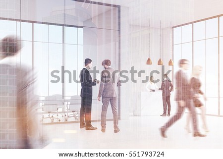 Rear view of business people in suits walking in an office corridor. Blond receptionist is talking to one. 3d rendering. Blurred. Double exposure.