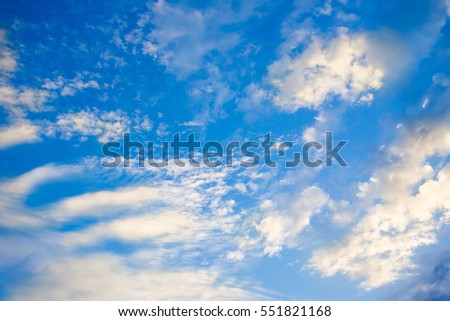 Beautiful a group of clouds in the blue sky during the sun shin background.