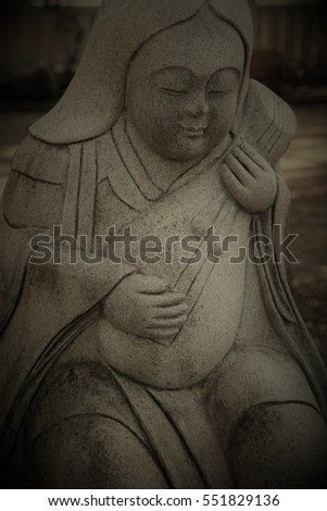 Stone statue, seven lucky gods, God of wisdom & beauty & entertainment, Benzaiten, at Kumakawa Shrine.