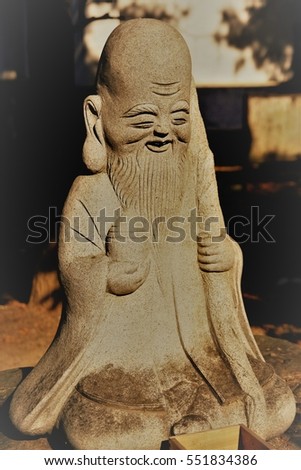 Stone statue, seven lucky gods, God of prolonging life & longevity Â· Fukurokuju, at Kumakawa Shrine.