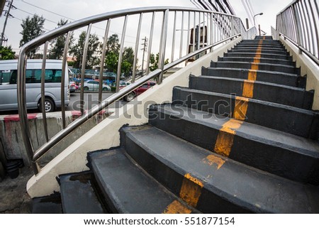 Wide angle view of stairs with yellow line in urban city
