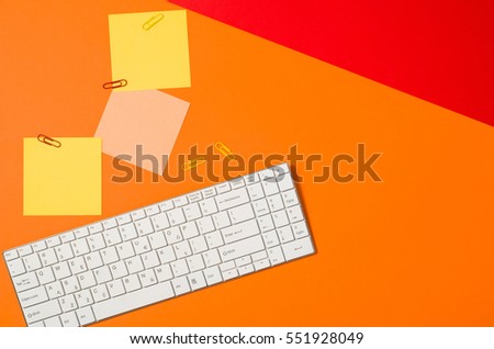 Sticky notes reminder on colorful office table or desk seen from above. Top view product photograph. Concept image with blank copy space