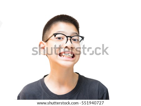 Asian boy wear black T-shirt is happy and smile. (white isolate)