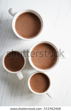 hot chocolate drinks in white cup, top view