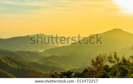 Sunrise over mountain range and mountain forest at the north of Thailand