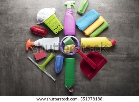 Cleaning products. Home cleaning concept. Top view. Place for typography and logo. Royalty-Free Stock Photo #551978188