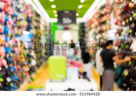 Abstract blur people looking around in shoes shop for background