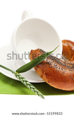 bread with poppy white cup and spike isolated on white