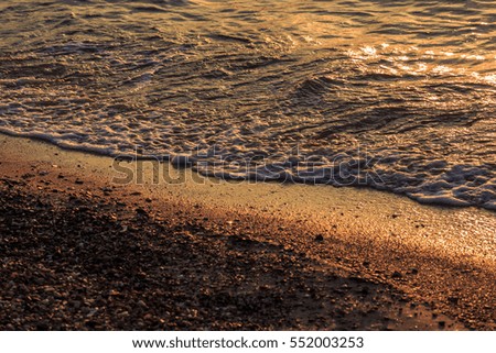 beach and wave in sunset time