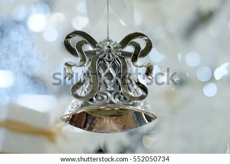 soft focus silver bell with bokeh lights backgrounds.