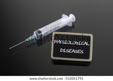 Medical Concept: Physiological Diseases with syringe on blackboard