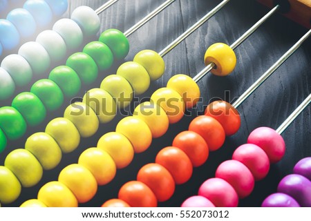 Colorful of wood abacus, background Royalty-Free Stock Photo #552073012