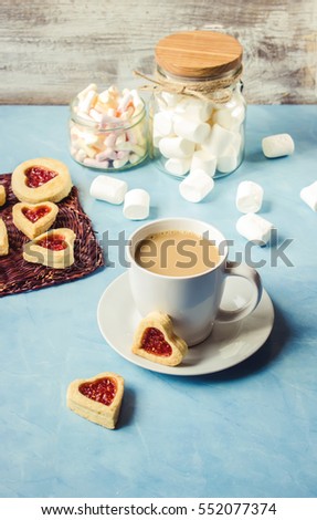 cocoa with marshmallows and a cookie heart. Selective focus. 