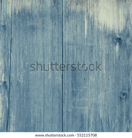 Old blue wooden wall, detailed background photo texture. Wood plank fence close up. Retro color style.