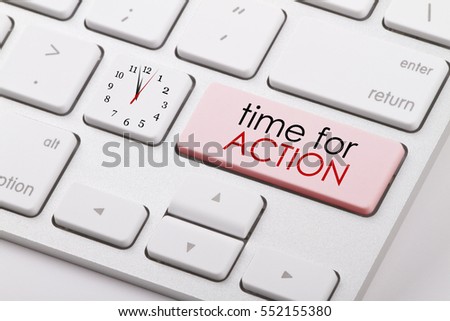 Time for action written on computer keyboard.