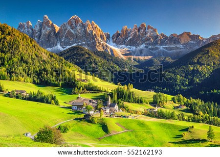 Famous best alpine place of the world, Santa Maddalena village with magical Dolomites mountains in background, Val di Funes valley, Trentino Alto Adige region, Italy, Europe Royalty-Free Stock Photo #552162193