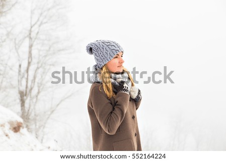 Attractive young woman in wintertime