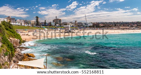 Bondi Beach in Sydney on a sunny day. Royalty-Free Stock Photo #552168811