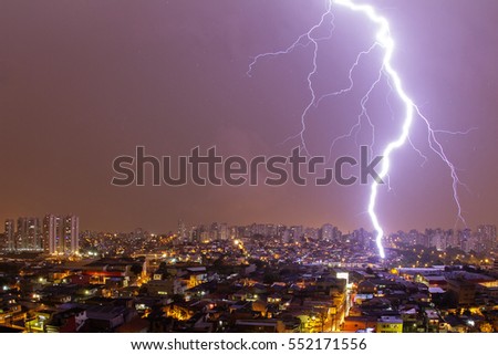 Lightning storm over the Sao Paulo city in purple night