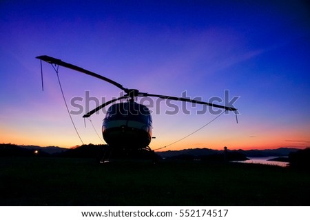 Twilight helicopter on the helipad.