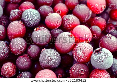 Background of Close up of frozen cranberries Royalty-Free Stock Photo #552183412