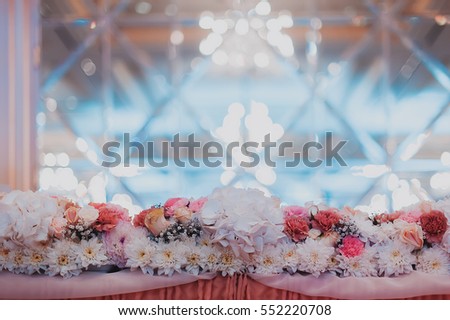 banqueting hall decorations with flowers. wedding concept. vintage toned picture