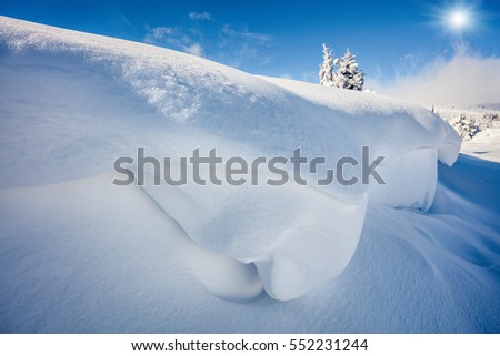Huge mounds of snow in Carpathian mountains. Sunny outdoor scene, Happy New Year celebration concept. Artistic style post processed photo.
