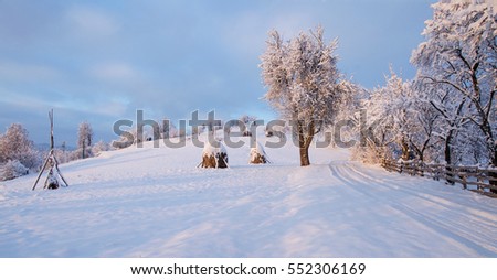  Winter landscape with country road on the hill