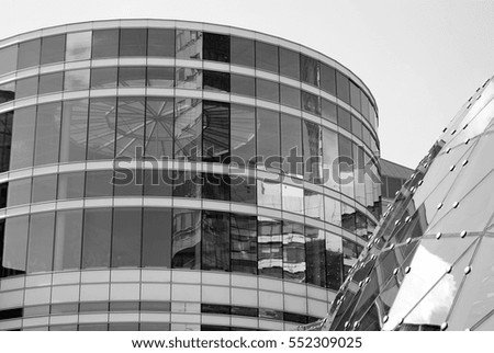 Modern building. Modern office building with facade of glass.Black and white
