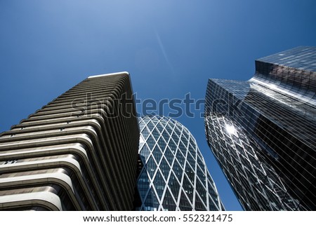 Skyscrapers with glass facade. Modern buildings in Paris business district. Concepts of economics, financial, future.  Copy space for text. Dynamic composition. Toned