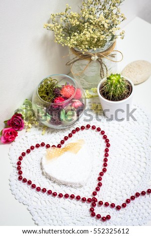 Happy valentines day. Happy Wedding day. Happy birthday card. Love concept. Shabby chic interior decor design. Heart on background. Flowers, ribbon, cactus and handmade decorations. Holidays concept