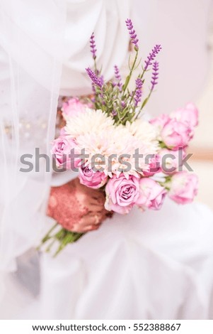 Brides holding a hand bouquet flower for wedding day. A shallow depth of field. Soft focus