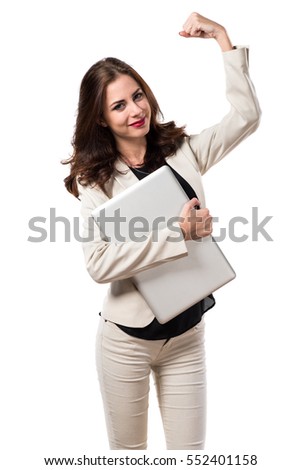 Lucky pretty young business woman with laptop
