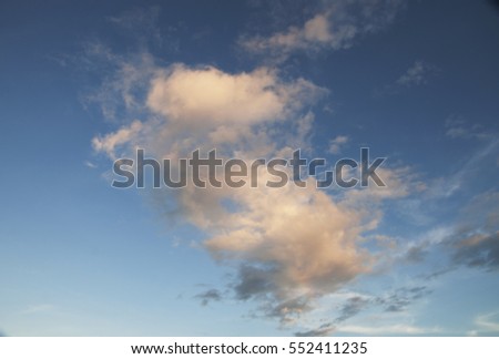 white cloud during a sunrise with blue sky background 