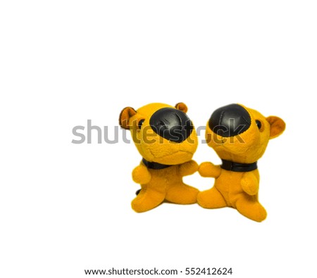 Two yellow stuffed dog.