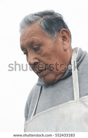 Old sad latin man 