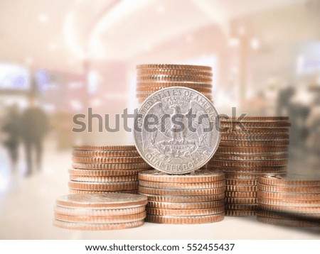 Double exposure of coins stack with Blurred image of department store use for business financial background