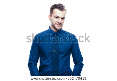 Handsome stylish young man in shirt looking at the camera. Office worker. Business decisions. Beautiful light background. Isolated