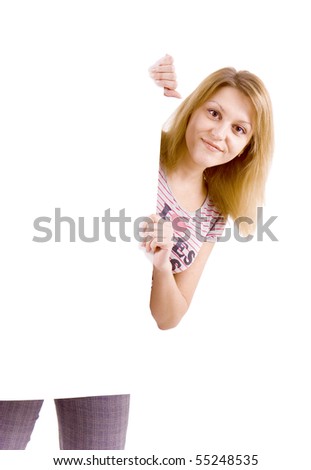On white background the smiling young woman behind the white stand