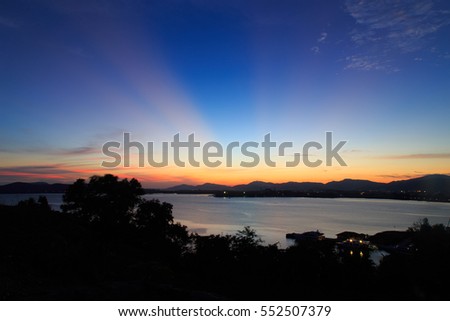 Vibrant and and colorful purple sunset with silhouette of mountain/Colorful sunset behind mountains/ Sky after sunset a beautiful colorful/Beautiful twilight sky and landscape/
