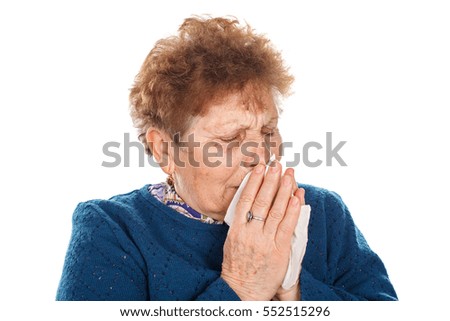Picture of an elderly woman having a flu - isolated background