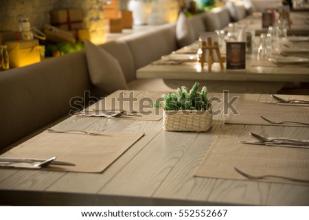 Table Setting For Lunch in Restaurant Royalty-Free Stock Photo #552552667