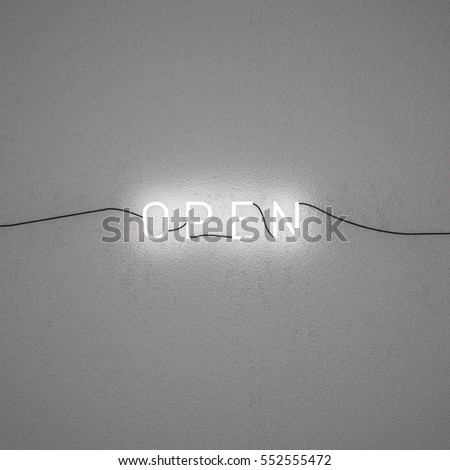  open text, LED neon light on wall 