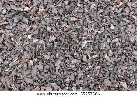 Rubber tires recycled into mulch for playground Royalty-Free Stock Photo #55257586