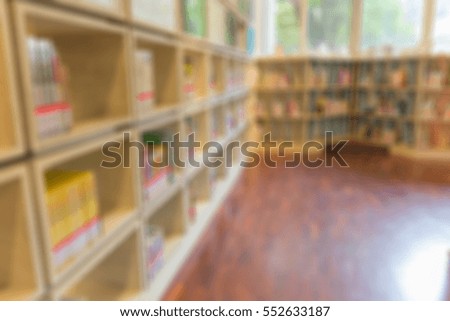 blurred background of library or Book shelf. Knowledge and Research in Education concept.