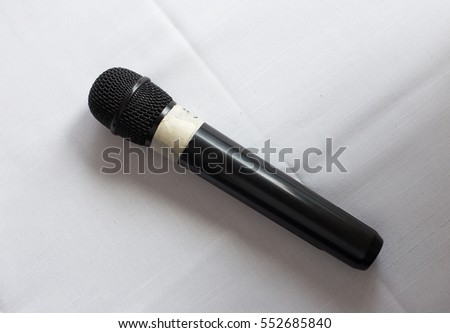 The microphone on white background , day light