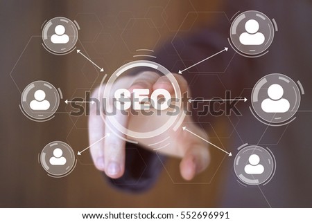 Businessman pressing button seo network business group. Concept virtual seo.